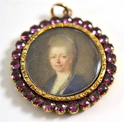 Lot 588 - A miniature of a lady