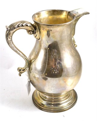 Lot 600 - A baluster silver beer jug