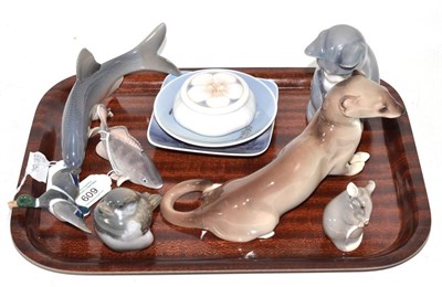 Lot 609 - Four Royal Copenhagen animal figurines of a duck, bird and two fish, two Royal Copenhagen pin trays