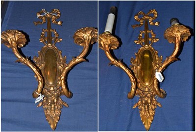 Lot 619 - A pair of bronze two branch appliques