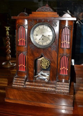 Lot 660 - A Gothic style quarter striking table clock, 19th century, organ form case, 4-inch dial with...