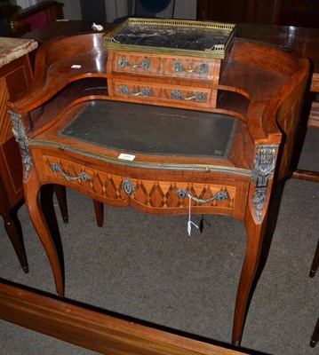 Lot 675 - A Louis XV style rosewood bureau a Rognon, late 19th/early 20th century, of serpentine shaped...