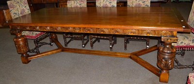 Lot 695 - Bespoke reproduction dining table by the Royal Oak Furniture Company, raised on carved bulbous legs