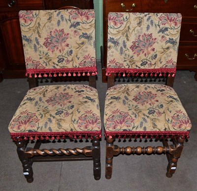 Lot 696 - Eight English joined oak dining chairs, later recovered in floral fabric with turned supports