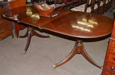 Lot 698 - George III style double pedestal dining table