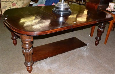 Lot 703 - A Victorian mahogany telescopic dining table with two additional leaves