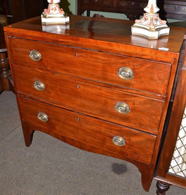 Lot 708 - A 19th century mahogany three drawer straight fronted chest of drawers