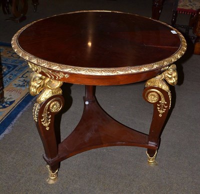 Lot 710 - A reproduction gilt metal mounted centre table