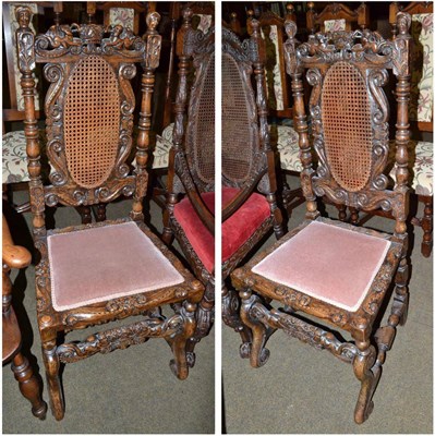 Lot 716 - Pair of carved oak hall/side chairs