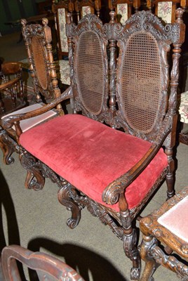 Lot 717 - Carved oak sofa in the 17th century style