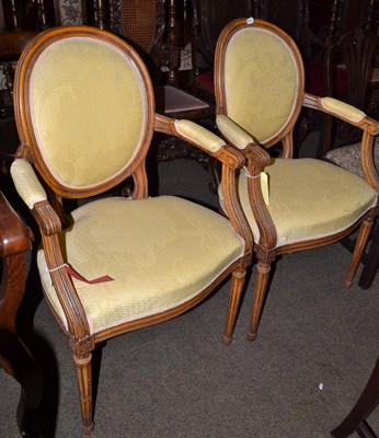 Lot 719 - # Pair of beech framed armchairs in the French Hepplewhite style