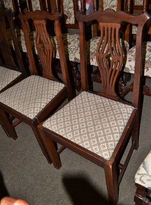 Lot 732 - Set of four Chippendale revival dining chairs (three single and one carver)