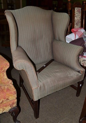 Lot 735 - ~ George III wingback armchair