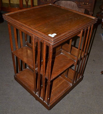 Lot 738 - An oak revolving bookcase