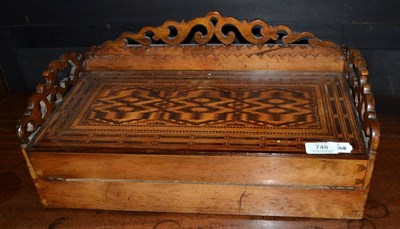 Lot 748 - A 19th century walnut and parquetry decorated writing box