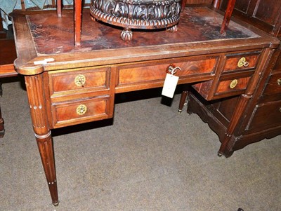 Lot 749 - # A 19th century Continental walnut desk on stop-fluted legs