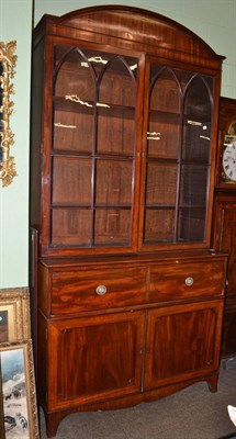 Lot 776 - A Regency mahogany and ebony strung secretaire bookcase