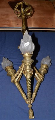 Lot 781 - A late 19th century brass three branch chandelier with frosted glass shades