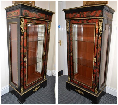 Lot 783 - Pair of ebonised and brass inlaid Boulle style display cabinets