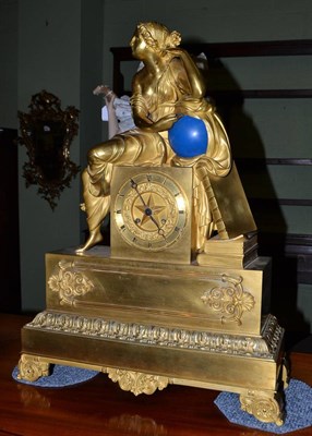 Lot 787 - An ormolu striking figural mantel clock, circa 1850, surmounted with a reclining figure, base...