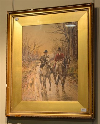 Lot 1062 - John Sanderson Wells (1872-1955) A huntsman and a lady riding along a woodland path, signed,...