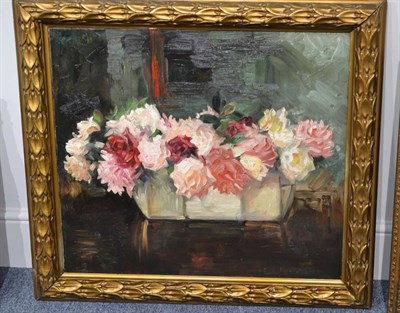 Lot 1093 - Circle of J Heinemann (19th/20th century) Still life of red and pink roses on a ledge, indistinctly