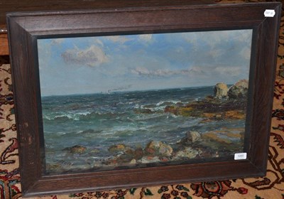 Lot 1095 - John Falconer Slater (1857-1937) Shipping vessel off a rocky coastline, signed, oil on canvas, 40cm