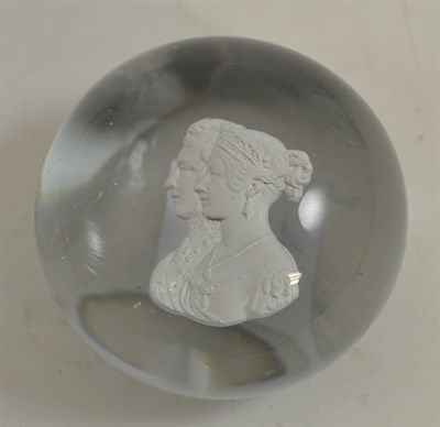 Lot 16 - A sulphide paperweight, 19th century, set with bust portraits of Queen Victoria and Prince...