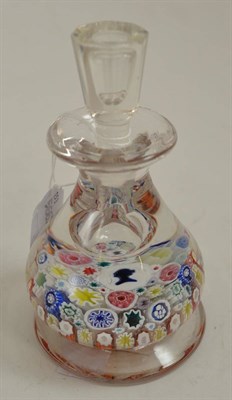 Lot 17 - A millefiori glass inkwell and stopper, late 19th century, set with the young queen's head on a...