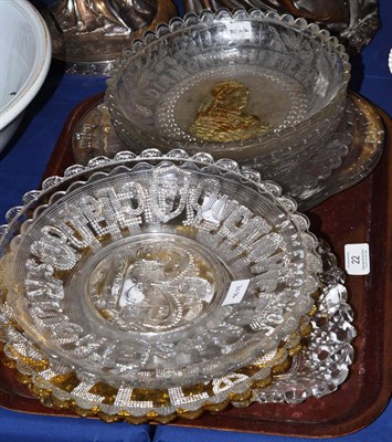 Lot 22 - A pair of pressed glass Diamond Jubilee commemorative dishes, gilt with portraits of Queen...