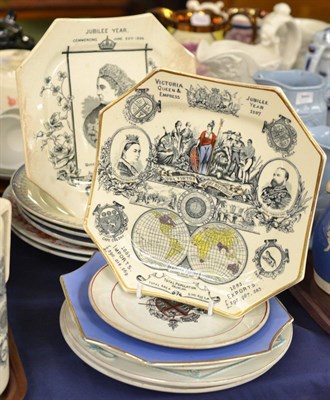 Lot 36 - A Harlequin pair of Royal Worcester pottery Golden Jubilee commemorative plates, 27cm diameter; and
