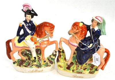 Lot 68 - A pair of Staffordshire pottery equestrian figures of Queen Victoria and Albert, circa 1870, picked