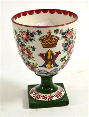 Lot 83 - A Weymes pottery diamond jubilee commemorative goblet, circa 1897, painted with the crowned...