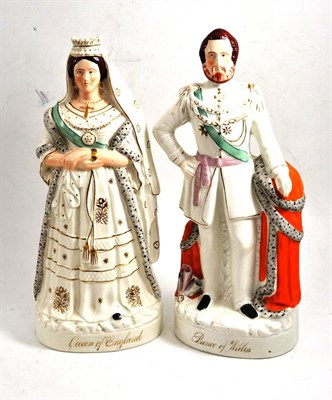 Lot 108 - A pair of Staffordshire pottery figures of Queen Victoria and the Prince of Wales, circa 1870, each
