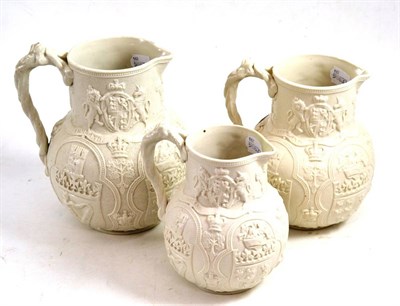 Lot 110 - A graduated set of three William Brownfield Albion pattern smear glazed stoneware jugs,...