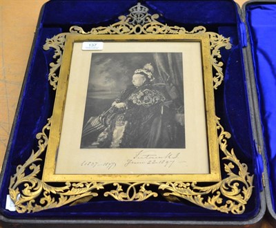 Lot 137 - A presentation frame containing a print of Queen Victoria which bears a printed facsimile of...