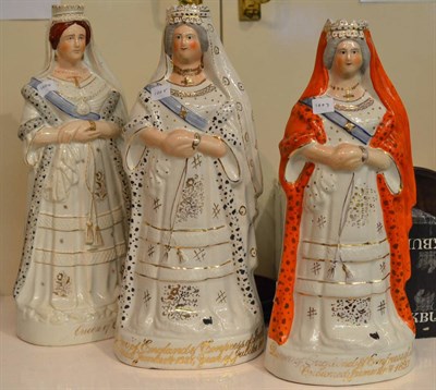 Lot 138 - A Staffordshire pottery figure of Queen Victoria, circa 1890, wearing regal robes, the base...