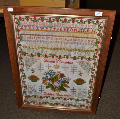 Lot 167 - A Golden Jubilee commemorative sampler, dated 1887, worked in coloured wool with alphabets over...