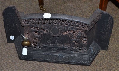 Lot 179 - A cast iron fire grate circa 1887 cast and pierced with a ship flanked by the royal supporters...