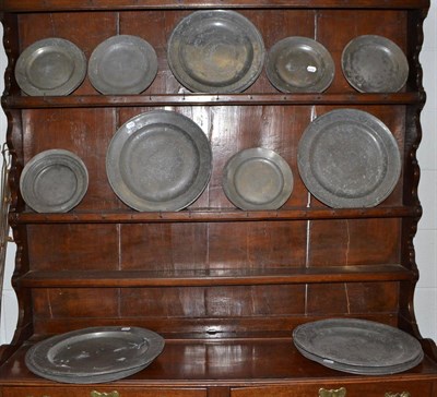 Lot 200 - Nine large pewter plates and seventeen smaller examples