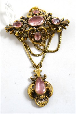 Lot 209 - A Victorian brooch, a quatrefoil section inset with five foil backed oval cut quartz, to swag drops