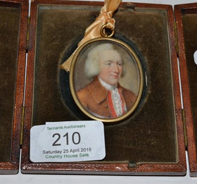 Lot 210 - An 18th century portrait miniature of a gentleman in triptych case