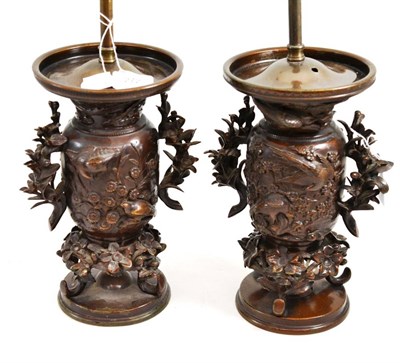 Lot 272 - Pair of Japanese bronze vases, circa 1900, decorated with birds and branches, adapted as lamp...