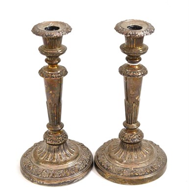 Lot 284 - Pair of George IV filled silver candlesticks, with nozzles, Sheffield 1827, 26cm high