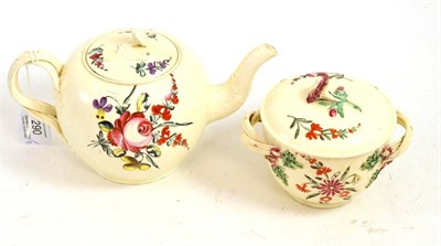 Lot 290 - Leeds creamware teapot and cover, circa 1760, painted with flower sprays, 10.5cm high; and a...