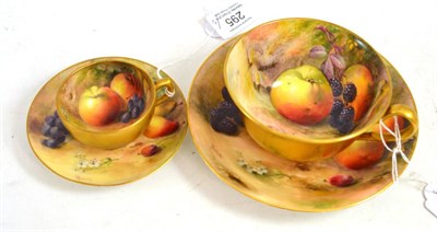 Lot 295 - A Royal Worcester porcelain teacup and saucer, painted by Ricketts with still life of fruit;...