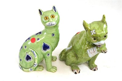 Lot 301 - A Mosanic faience figure of a cat, early 20th century, with glass eyes, the green animal...