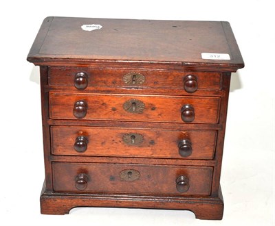 Lot 312 - Early Victorian mahogany miniature four drawer chest