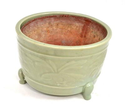 Lot 316 - A Chinese celadon glazed censer, Longquan style, 26cm diameter, with metal line