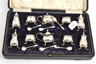 Lot 322 - A cased sixteen piece silver cruet